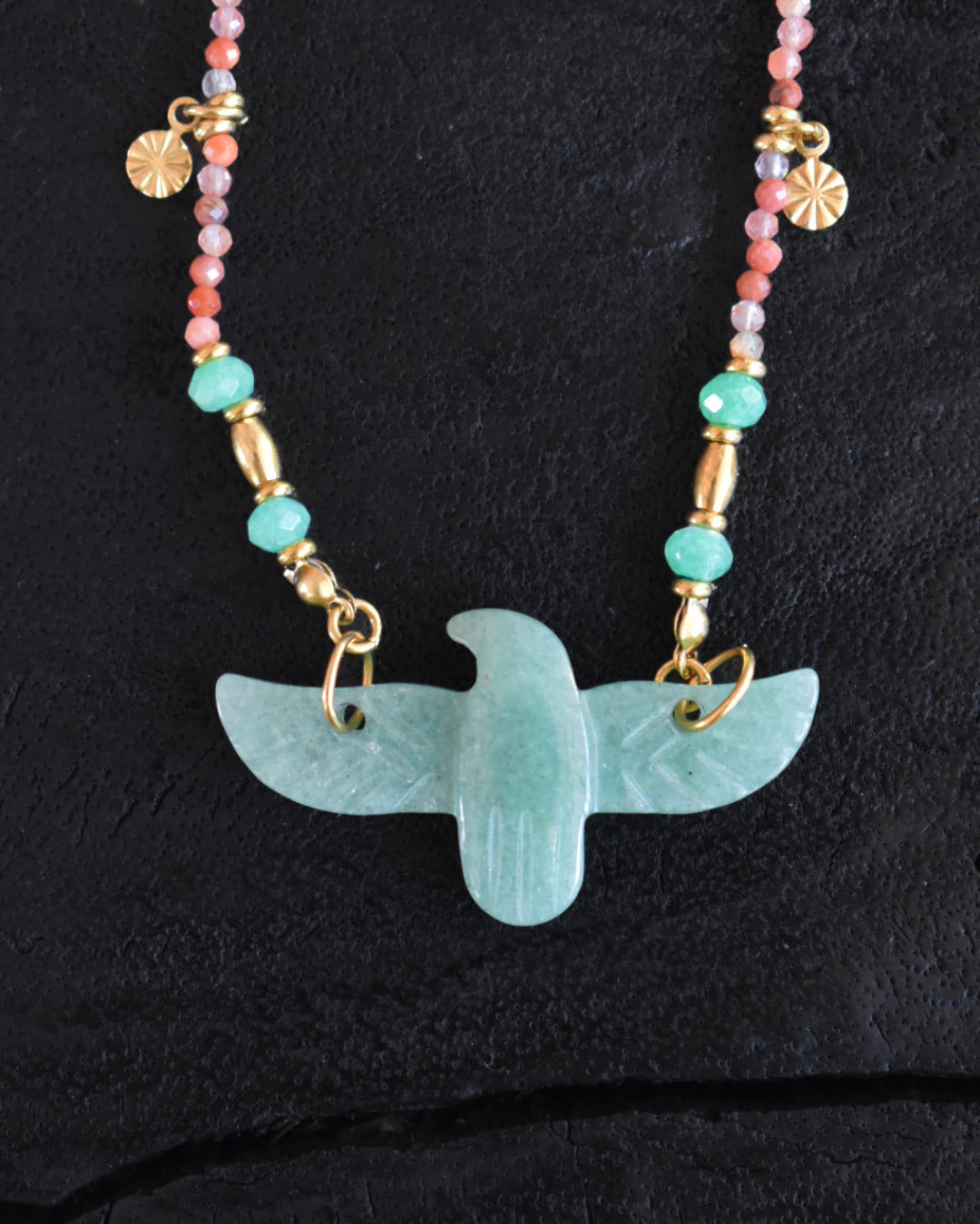 Necklace with an eagle turquoise pendant on a black background